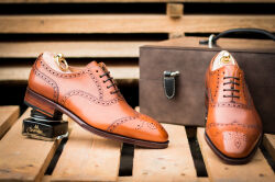 Yanko 14780 cambridge cuero. Eleganckie obuwie z ażurkami i dekoracyjnymi zdobieniami koloru jasno brązowego typu brogues z skórzaną podeszwą. Szyte metodą ramową.