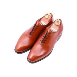 Klasyczne męskie obuwie koloru jasno brązowego typu oxford szyte metodą goodyear welted.