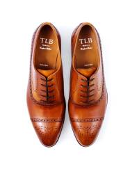 Jasno brązowe Eleganckie obuwie z ażurkami i dekoracyjnymi zdobieniami typu brogues. Szyte metodą  goodyear welted. TLB 542 old england cuero.