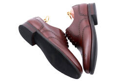 Brązowe eleganckie stylowe skórzane buty klasyczne Patine 77020 cambridge dark brown typu brogues.