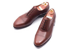 Luksusowe eleganckie brązowe buty typu oxford szyte metodą ramową.Formalne buty męskie na spotkania biznesowe.